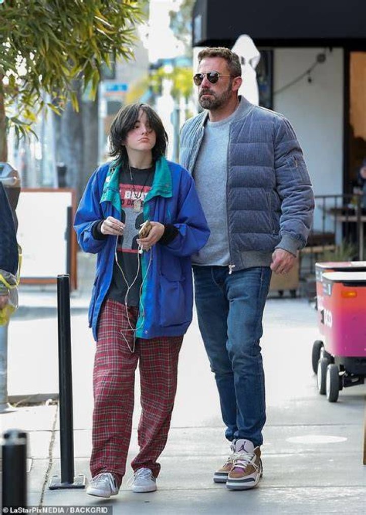 Ben Affleck embraces his daughter Violet as he takes his children for a