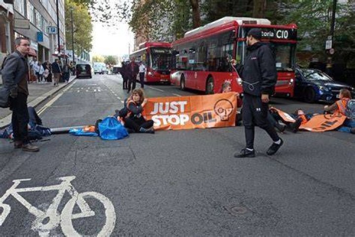 Drivers drag Just Stop Oil protesters away during London road blockages