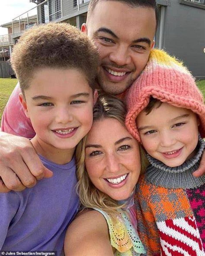 Guy Sebastian beams alongside his wife Jules and his lookalike sons
