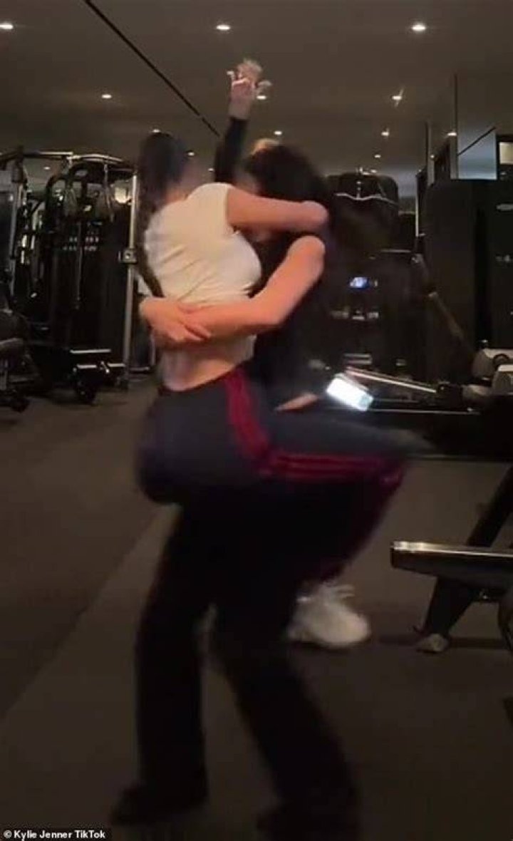 Kylie Jenner playfully carries Kim Kardashian while performing fun
