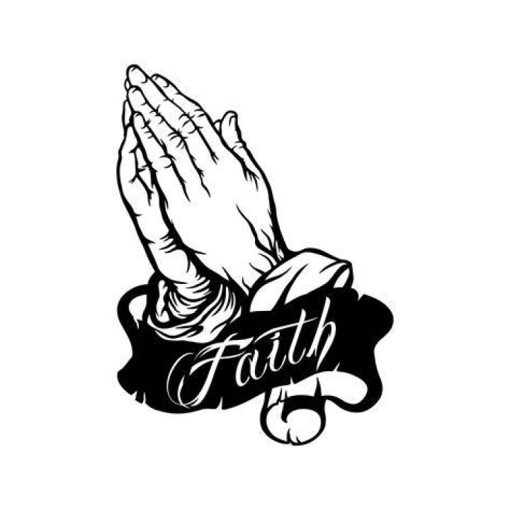 Praying hands with faith in religion and belief in God on dark