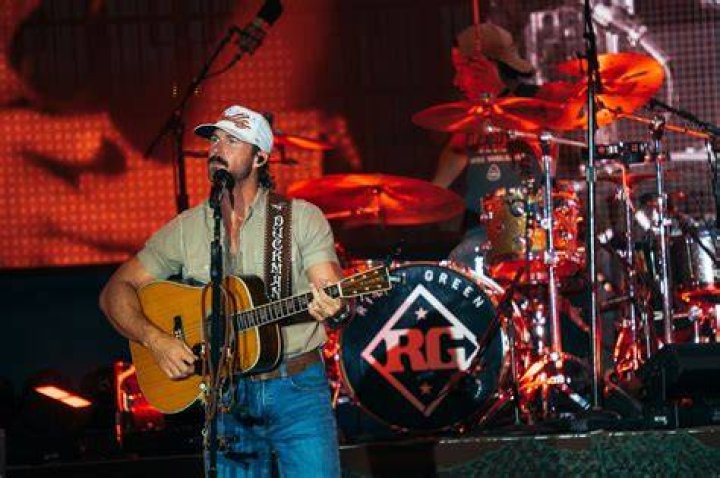 Riley Green Brings Music City to Belize for 'In Love By Now' Video