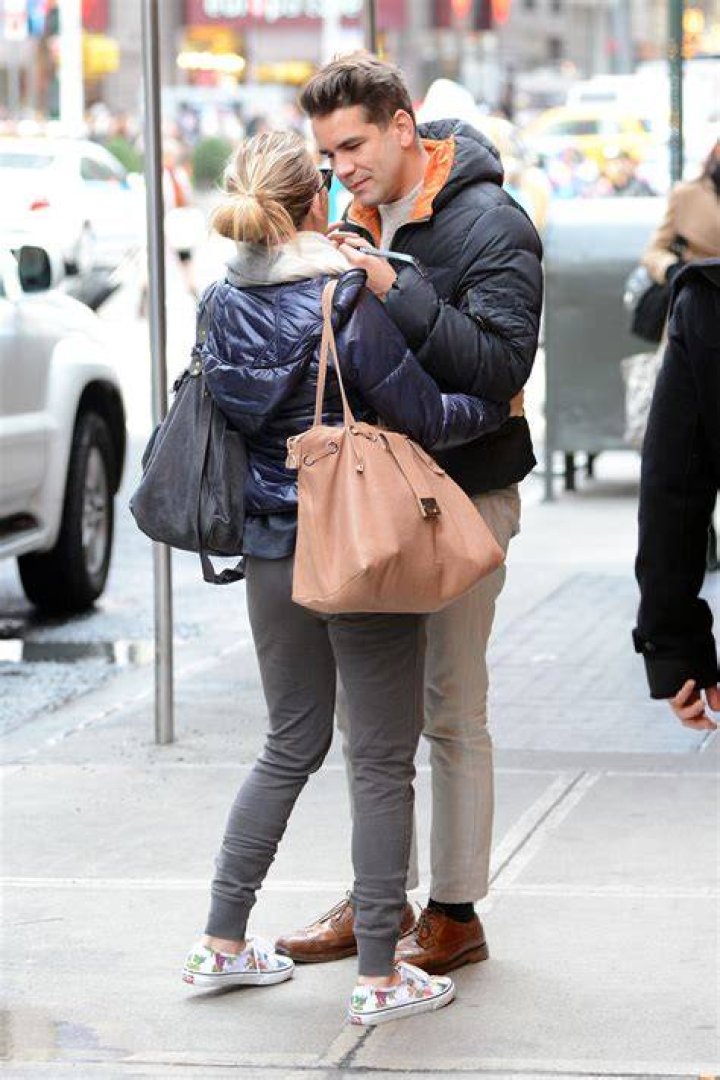 SCARLETT JOHANSSON Kisses Romain Dauriac Outside Her Hotel in New York