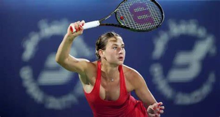 Who are Marta Kostyuk's parents, Oleg Kostyuk and Talina Beiko